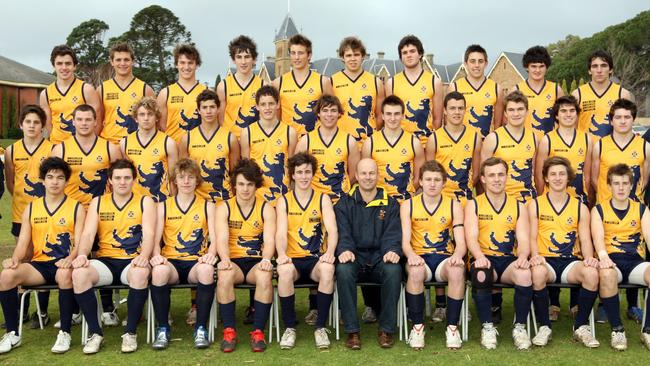 Matthew Nicks sits alongside Rory Laird (on his left) with the Scotch College First XVIII football team in 2010. Image: Scotch College