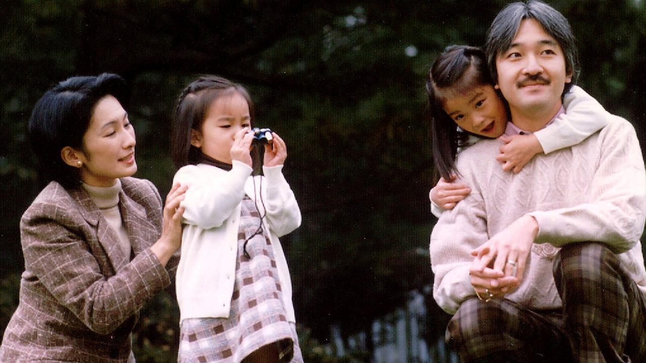 In 2008, Japan's Prince Akishino a d Princess Kiko in garden of Akasaka Palace with daughters Mako and Kako. Picture: News Ltd