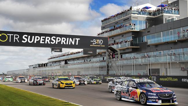 Jamie Whincup leads teammate Shane van Gisbergen off the grid at the start of Race 23 for the Supercars SuperSprint at The Bend Motorsport Park on Sunday. Picture: Daniel Kalisz/Getty Images)