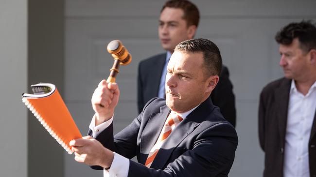 Auctioneer Damien Cooley brings the gavel down on a recent Alexandria auction. Picture: Julian Andrews