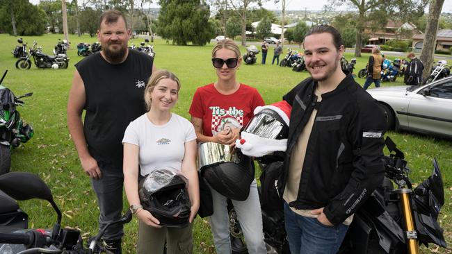 John Dewit, Amanda Gibb, Tiana Pennington and Matt Cook at the Downs Motorcycle Sport Club 2024 toy run. Sunday, December 15, 2024. Picture: Christine Schindler