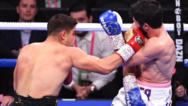 Bilal Akkawy gets through John Ryder’s defence during their super middleweight fight at T-Mobile Arena. Picture: Ethan Miller/Getty Images