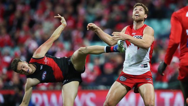 Dane Rampe tangles with Essendon’s Orazio Fantasia last Friday night. Picture: Phil Hillyard