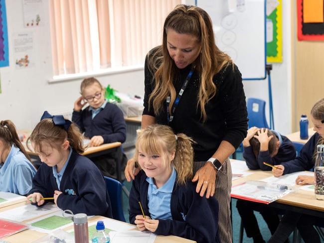 Year four pupils are taught at Willowpark Primary Academy in Oldham, northern England on September 7, 2020. - Millions of children across England have returned to school this week after the COVID-19 lockdown, with many schools introducing measures to enable as safe an environment as possible. Education Secretary Gavin Williamson said that the return of pupils to schools in England will be a 'massive milestone'. (Photo by OLI SCARFF / AFP)