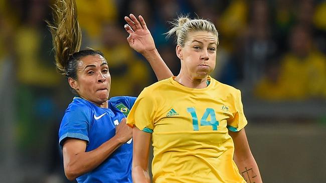 BELO HORIZONTE, BRAZIL - AUGUST 12:  Alanna Kennedy #14 of Australia controls the ball in the first half against Marta #10 of Brazil during the Women's Football Quarterfinal match at Mineirao Stadium on Day 7 of the Rio 2016 Olympic Games on August 12, 2016 in Belo Horizonte, Brazil.  (Photo by Pedro Vilela/Getty Images)