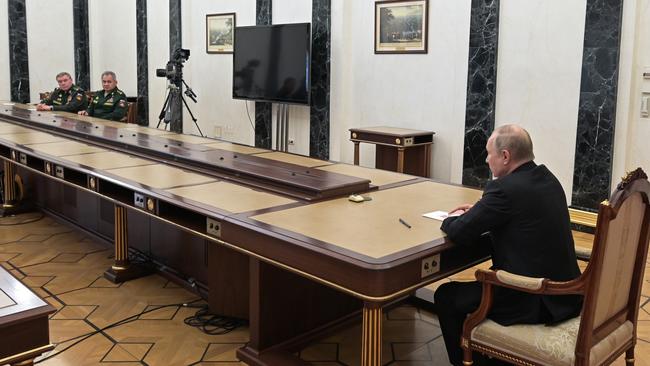 Russia's President Vladimir Putin, far right, meets with Russia's Defence Minister Sergei Shoigu, middle, and Valery Gerasimov. Picture: Alexei Nikolsky\TASS via Getty Images