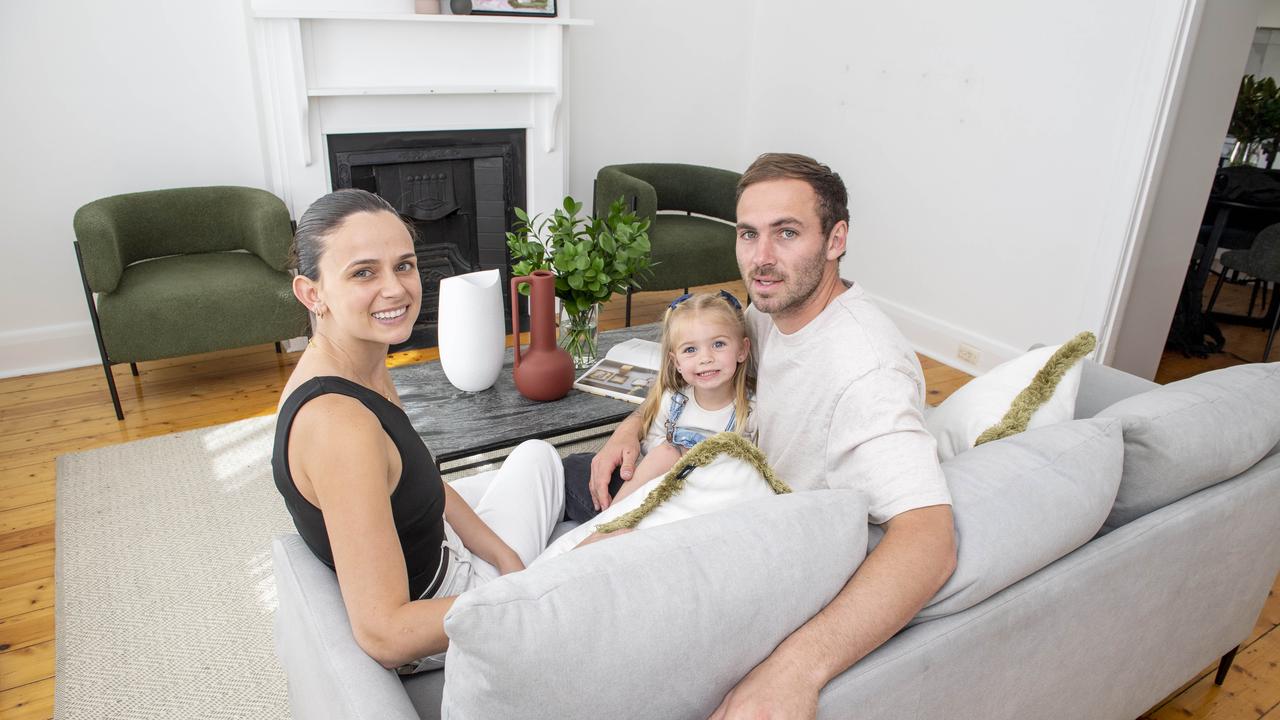 Kellie and Jeremy Finlayson with their daughter Sophia, 3, in their home. Picture: Mark Brake