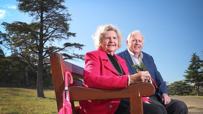 Margaret Davis, 84, of Mt Nelson, left, with her cousin Peter Smith, 74, of Lindisfarne, at the tree planted for their grandfather Charles Smith on the Soldiers’ Memorial Avenue. Picture: SAM ROSEWARNE