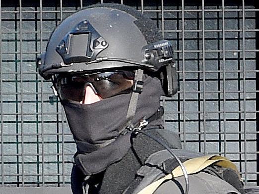 SOG police enter the clubrooms.  The police raid Comancheros bikie club house in Thistlewaite Street South Melbourne.  Picture: Nicole Garmston