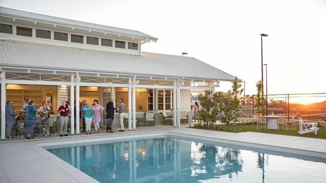 Guests of Pradella Property Ventures inspect the new summer house at the upcoming $71 million Seachange retirement in Harristown. Picture: DK Photography