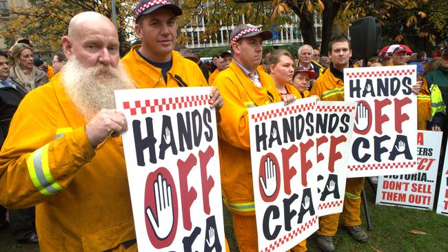 CFA members in a rally at Treasury Gardens. Picture: David Crosling