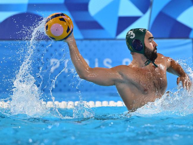 Milos Maksimovic is finally living out his Olympic dream for the Aussie Sharks. Picture: Andreas SOLARO / AFP