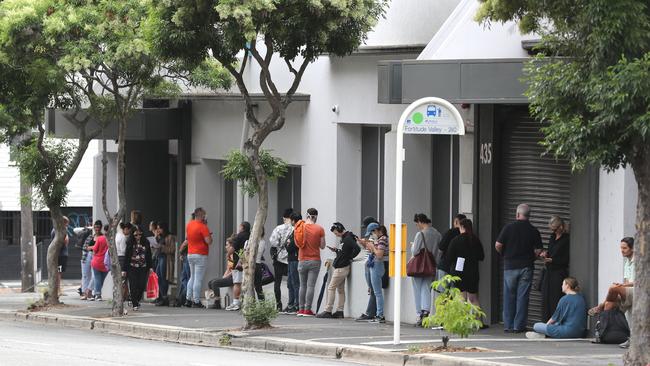 Crowds gather at the Fortitude Valley Centrelink in March. Picture: Peter Wallis