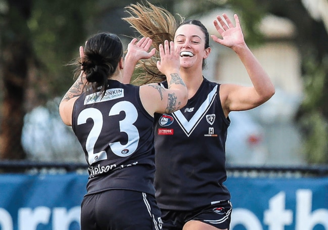 Federica Frew and Georgia Pirdis celebrate an Ivanhoe goal. Picture: Field of View Photography