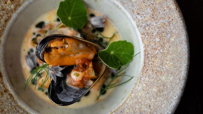 Freycinet blue lip mussels, zucchini kimchi and buerre blanc from Oirthir at Bream Creek, Tasmania. Picture: Adam Gibson