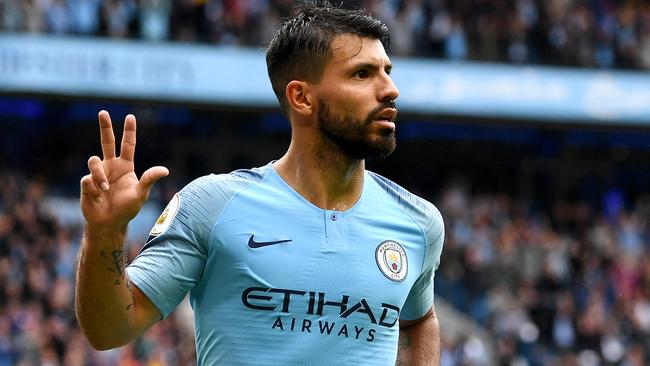 Manchester City’s Sergio Ageuro celebrates bringing up his hat-trick against Huddersfield Town on Sunday. Picture: Getty Images