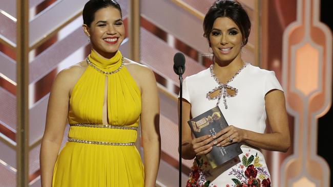 In this image released by NBC, America Ferrera, left, and Eva Longoria present an award at the 73rd Annual Golden Globe Awards at the Beverly Hilton Hotel in Beverly Hills, Calif., on Sunday, Jan. 10, 2016. (Paul Drinkwater/NBC via AP)