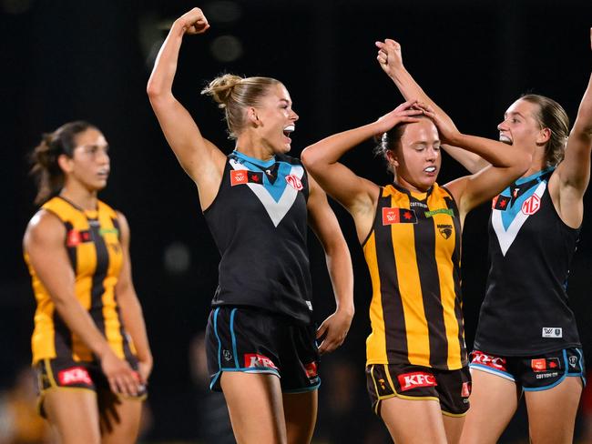 MELBOURNE, AUSTRALIA - NOVEMBER 16: Ashleigh Saint and Ella Boag of the Power celebrate winning the AFLW Semi Final match between Hawthorn Hawks and Port Adelaide at Ikon Park, on November 16, 2024, in Melbourne, Australia. (Photo by Quinn Rooney/Getty Images)