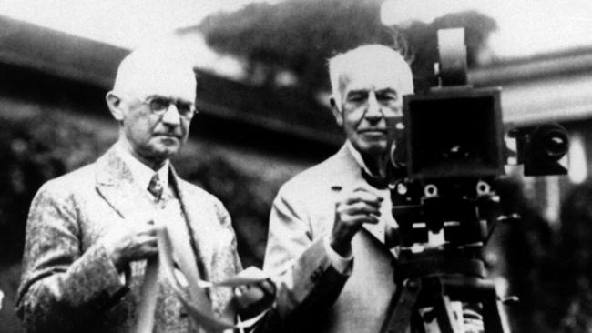 Eastman Kodak Company founder George Eastman (left) stands with a roll of film in the 1920s beside Thomas Edison, who was granted a patent for the motion picture camera or “Kinetograph” in 1891.