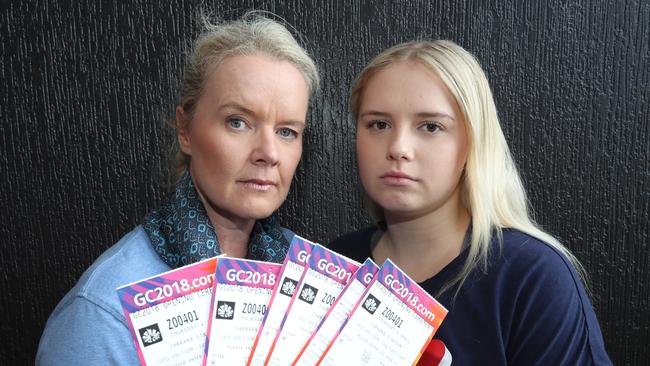 Jane Carroll, with daughter Mikayla, 18, paid a high price for tickets to the Gold Coast Commonwealth Games opening ceremony and could hardly see the event. Picture: Annette Dew