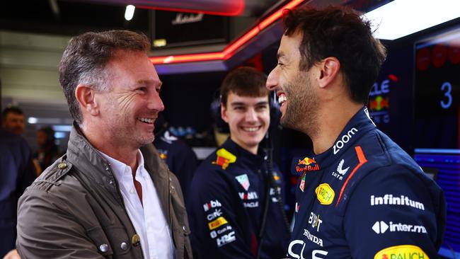 NDaniel Ricciardo of Australia and Oracle Red Bull Racing speaks with Red Bull Racing Team Principal Christian Horner. (Photo by Mark Thompson/Getty Images)