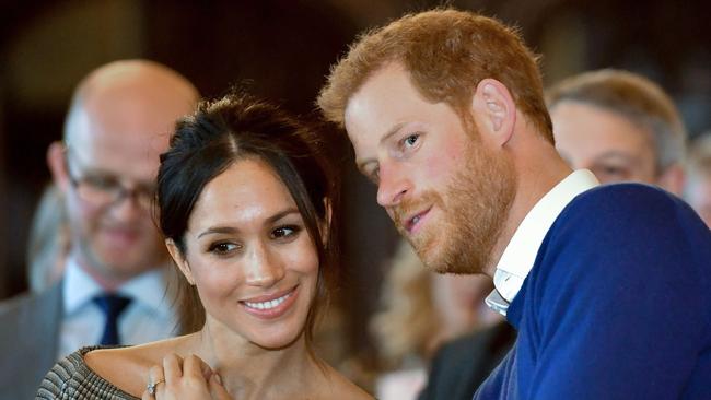 Prince Harry and Meghan Markle. AFP/Ben Birchall                        The Royal Wedding Day
