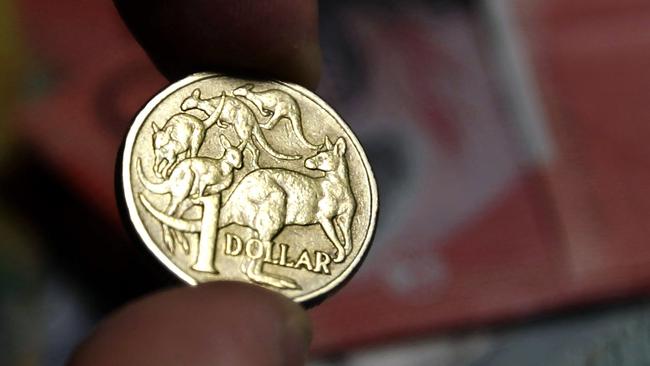 The Australian dollar has held its ground after rocketing to a two-year high over the weekend. Picture: Ian Waldie/Bloomberg