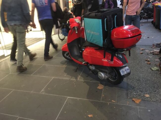 A food delivery scooter on Bourke St, Melbourne. Picture: Snap Send Solve