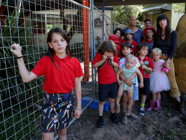 Kirra Jose, 10, (left) with a group of parents and their kids at Main Arm Pulbic School on March 22, 2022. Picture: Toby Zerna