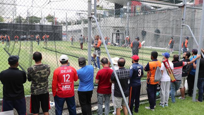 India fans watch the training at the Gabba. Picture: Peter Wallis