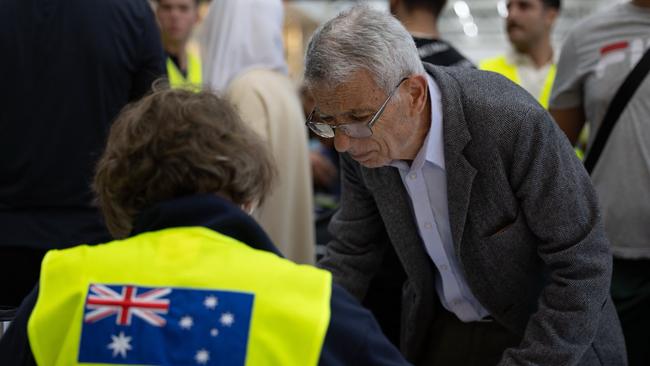 Australian government officials assist Australians to depart Lebanon on two government-supported charter flights from Beirut airport to Larnaca, Cyprus.