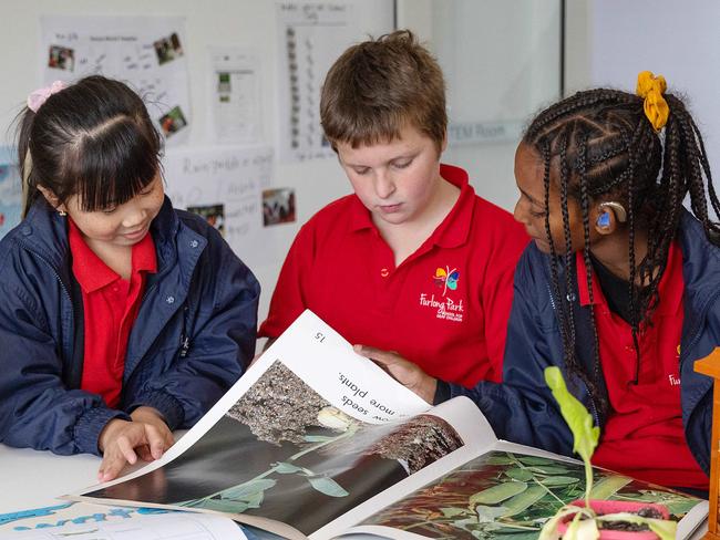 MELBOURNE, SEPTEMBER 2024: Furlong Park School for Deaf Children caters for children aged from three to grade six who have permanent, bilateral hearing loss. L to R Krystal, 9, Xavier, 10, Betselot, 10, Izayah, 10. Picture: Mark Stewart