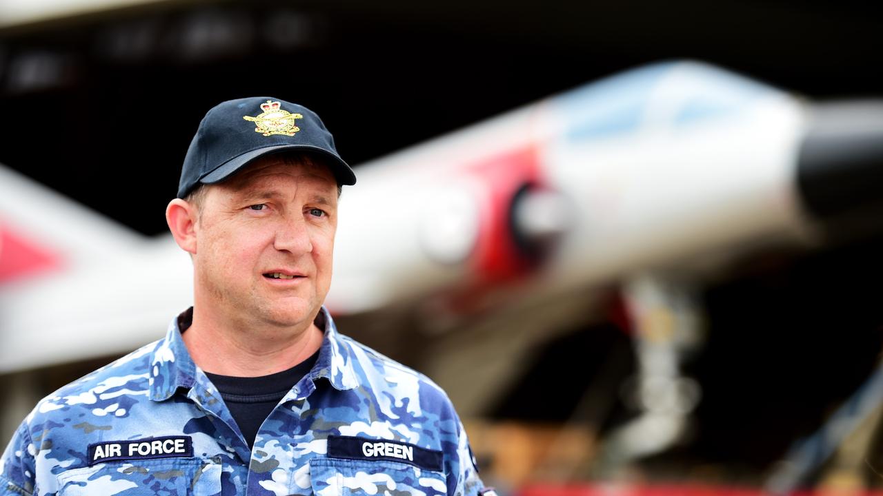 Two restored Royal Australian Air Force aircraft veterans- a Mirage fighter jet A3-55 and a Winjeel Trainer??? A85-403 - arrived at Townsville RAAF Base. WGCDR Mat Green speaks to media. Picture: Alix Sweeney