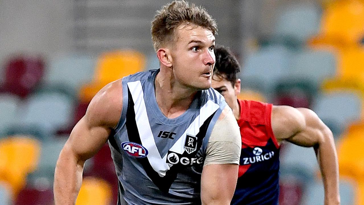 Ollie Wines during the 51-point drubbing of Melbourne. Picture: Bradley Kanaris/Getty Images