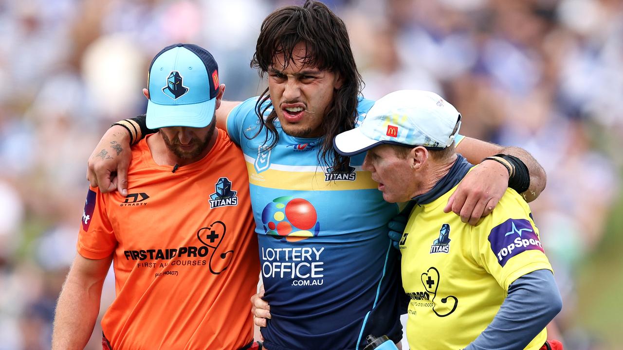 SYDNEY, AUSTRALIA - MARCH 23: Tino Fa'asuamaleaui of the Titans is helped from the field during the round three NRL match between Canterbury Bulldogs and Gold Coast Titans at Belmore Sports Ground, on March 23, 2024, in Sydney, Australia. (Photo by Brendon Thorne/Getty Images)