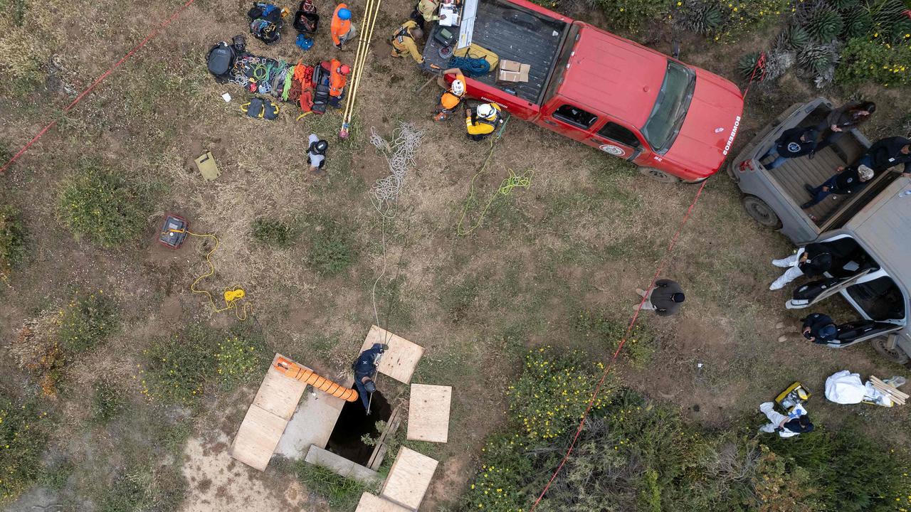 The bodies of Jake Robinson, 30, Callum Robinson, 33, and Jack Carter Rhoad, 30, were found in a well. Picture: Guillermo Arias / AFP