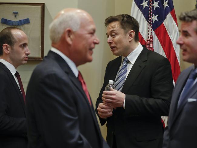 From left, White House senior adviser for policy Stephen Miller, CEO of Whirlpool Jeff Fettig, CEO of SpaceX and Tesla Motors Elon Musk, and CEO and Chairman of Under Armour at a breakfast with Donald Trump. Picture: AP Photo/Pablo Martinez Monsivais