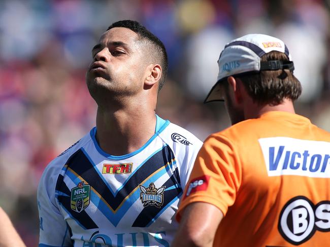 Jarryd Hayne leaves the ground after sustaining an injury.