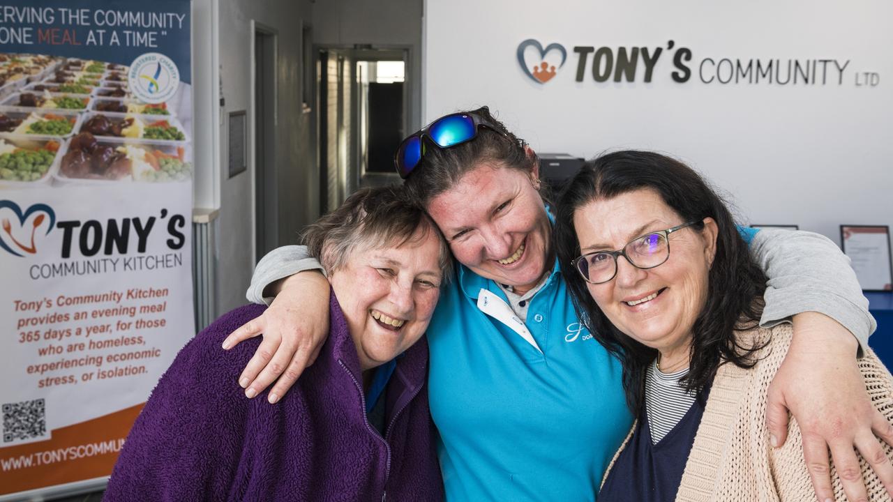 SERVING A SIDE OF HOPE: Jenn Belford (centre) thanks Tony's Community Kitchen directors Alison Hunter and Jo Noonan (right) as the charity opens in a new James Street address. Picture: Kevin Farmer