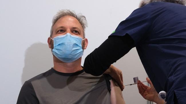 Victoria’s Chief Health Officer, Brett Sutton, receives his first COVID-19 vaccination. Picture: AFP