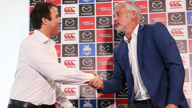 Brad Scott and Ben Buckley shake hands before parting ways. Picture: Getty