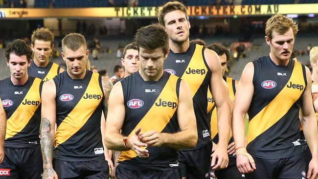 Captain Trent Cotchin leads the Tigers off the MCG after a fifth straight loss. Picture: Getty