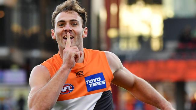 Jeremy Finlayson gives Doggies fans a big ‘shut up’ after goaling. Picture: AAP