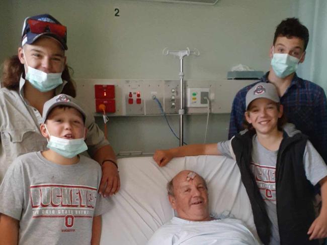 Will, Ned, Zac and Charlie Mellington with their grandfather John, who they helped save on Saturday.