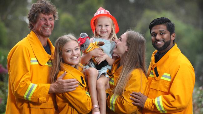 Face of the Good Friday Appeal Quinnie Westwood (centre) hangs out with CFA members Andrew Smith, Jodie Harris, Belinda Harris and Ahmad Jahfar. Picture: Alex Coppel.