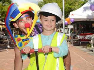 Chloe Coleman with a clown from the Coffs Coast Community Circus. Picture: Leigh Jensen