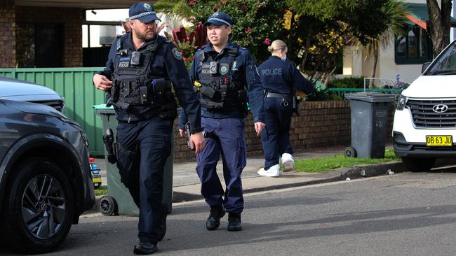 Police and forensics on the scene at a home in Croydon Park, where a body was found. Picture: NewsWire/Gaye Gerard