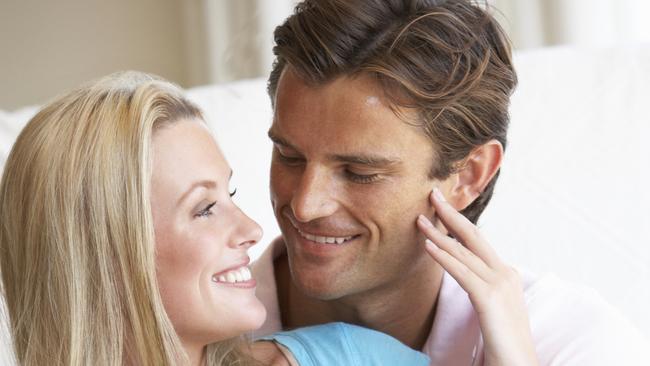 Young couple posing indoors