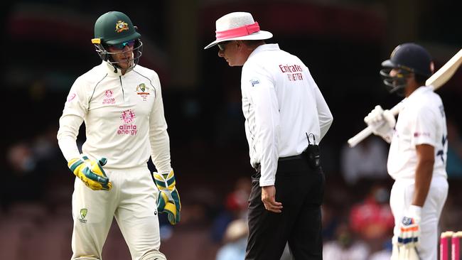 Australian Test captain Tim Paine speaks with umpire Paul Reiffel during the recent India Test series. Picture: Getty Images