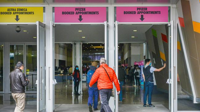 People enter the Wayville Covid vaccination hub in Adelaide. Picture: NCA NewsWire /Brenton Edwards